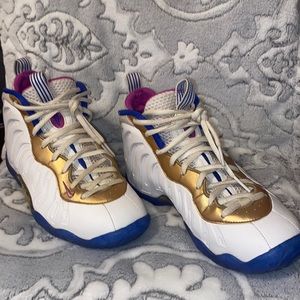 Nike foam runners, size 6 in woman, white w/ a tint of pink , blue, & gold